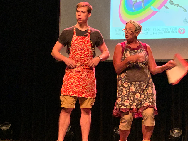 two people in flower aprons