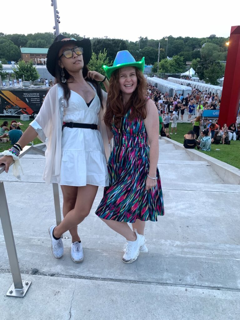 two girls wearing cowboy hats