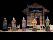people on stage in peasant dress