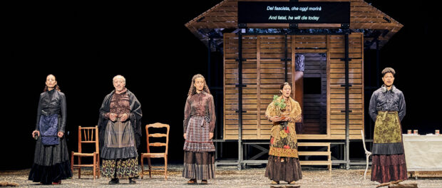 people on stage in peasant dress