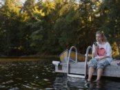 Girl beside lake