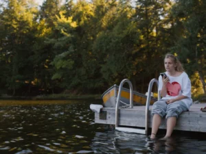 Girl beside lake