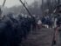 Police face off against activists in foggy bleak area