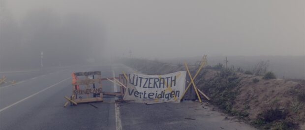 protest sign blocking smoky road