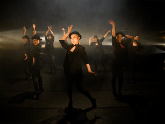 women dancing in black