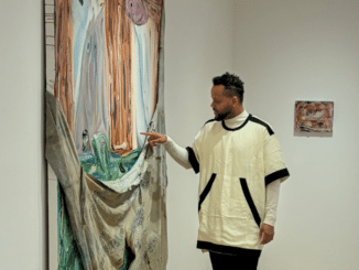 artist with artwork