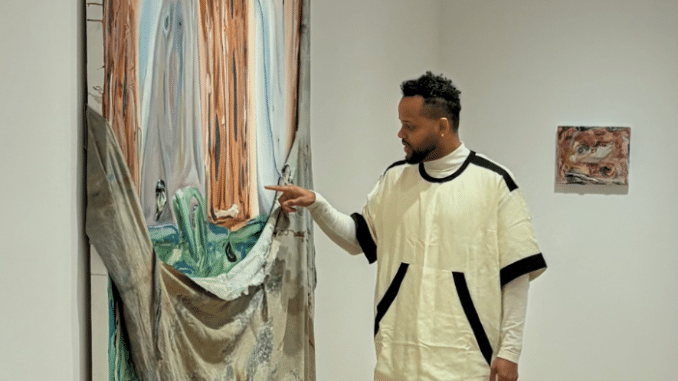 artist with artwork
