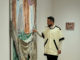 artist with artwork